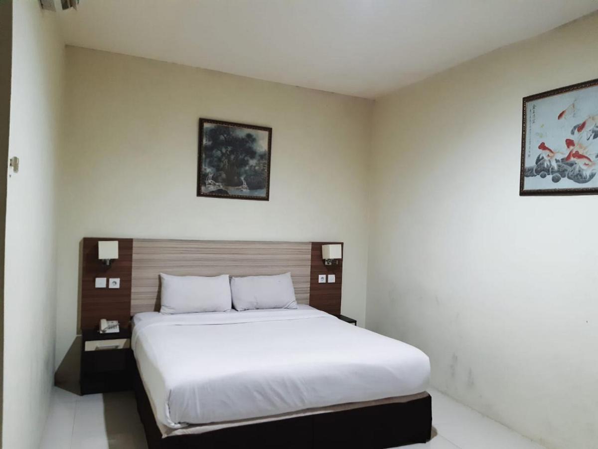 Agraha Andalas Hotel Макасар Экстерьер фото